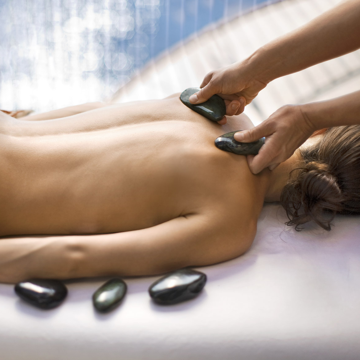 Guest receiving Sacred Stones treatment at the Post Ranch Spa in Big Sur, California